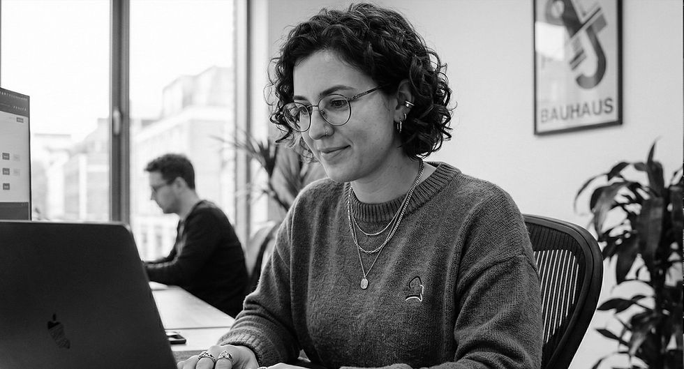 Graphic designer working at desk