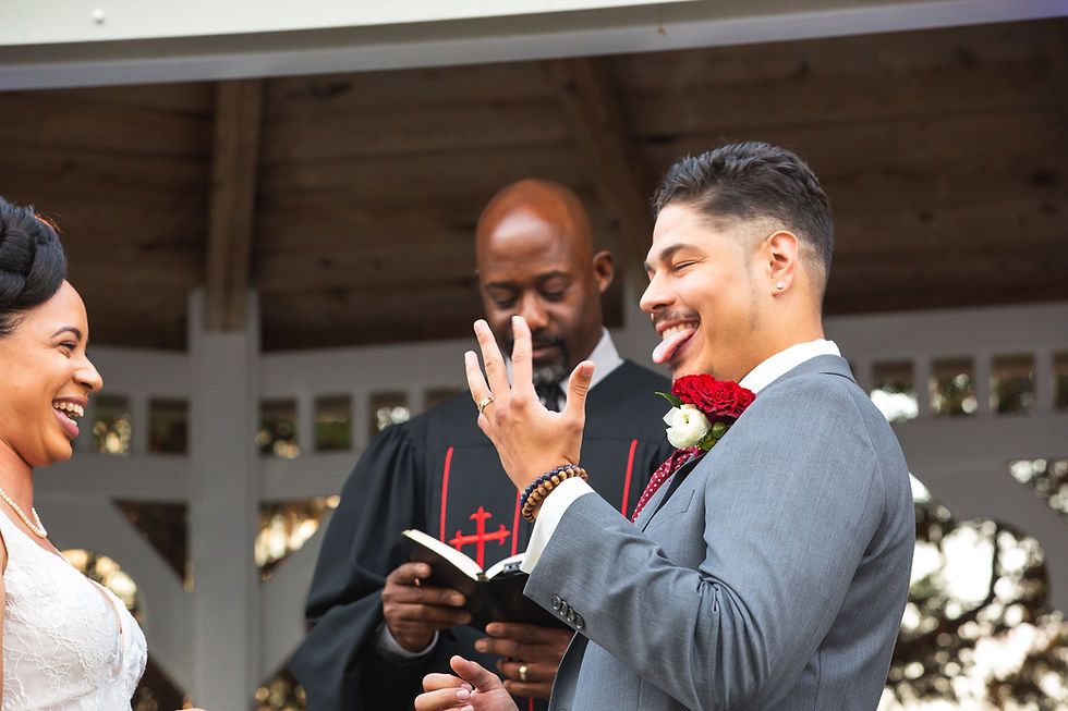 Groom showing off his wedding band during the wedding ceremony at Martin's Crosswinds in Greenbelt, Maryland.