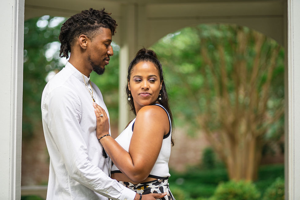 Couple at their engagement session at The Carlyle House in Old Town Alexandria, Virginia.