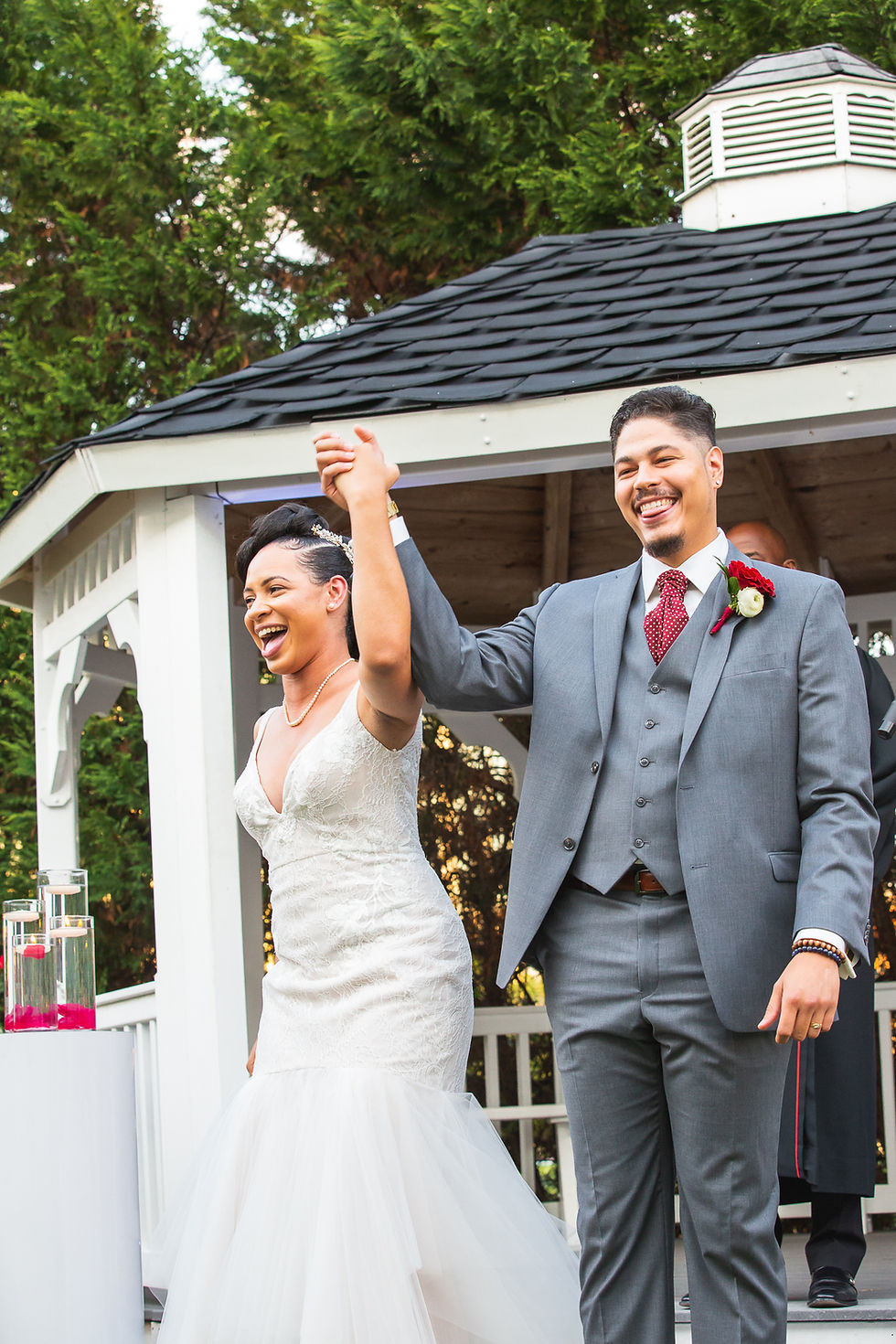 Bride and Groom after jumping the broom during the wedding ceremony at Martin's Crosswinds in Greenbelt, Maryland.