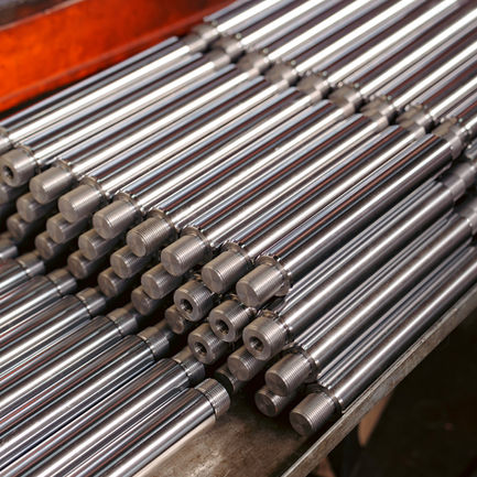 Machined metal rods from CNC machine
