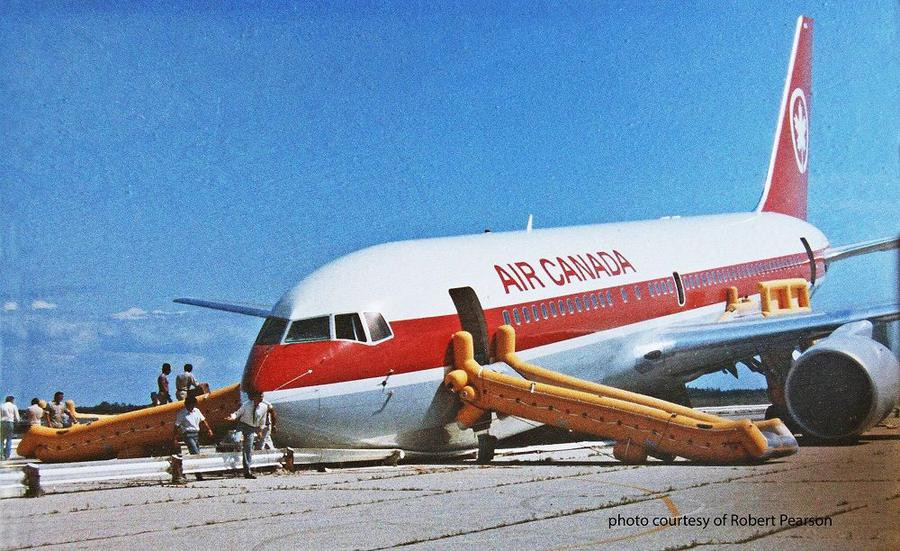 A plane with chutes deployed after an emergency landing