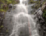 A canyoneer repels down a waterfall on Hong Kong's Lantau Island