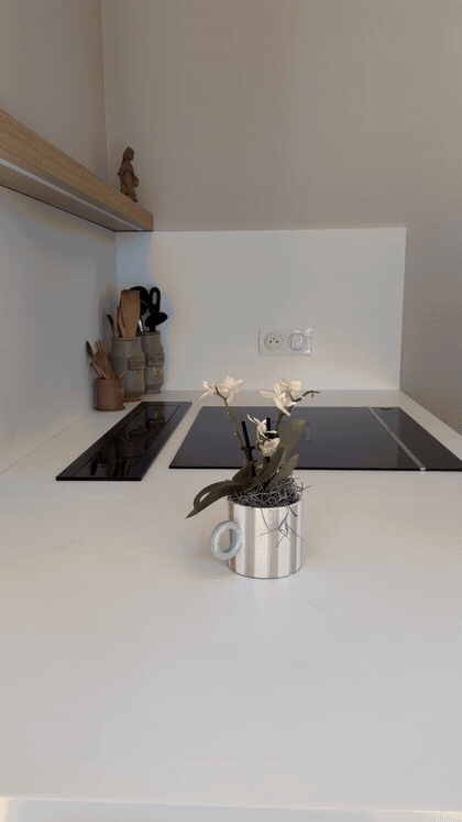 Système de hotte escamotable intégré au plan de travail de la cuisine