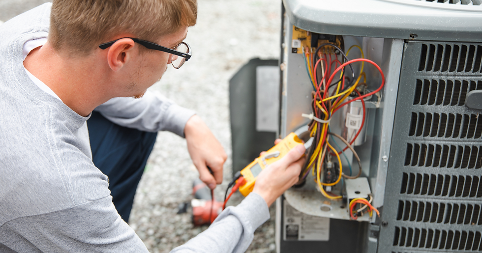 complete comfort technician fixing hvac unit