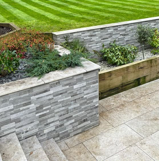 Red brick garden boundary wall construction in Southampton