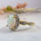 Thumbnail: Vintage Style Opal and Diamond Cluster Ring in 18ct Gold