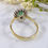 Thumbnail: Emerald and Diamond Cluster Ring in Yellow Gold