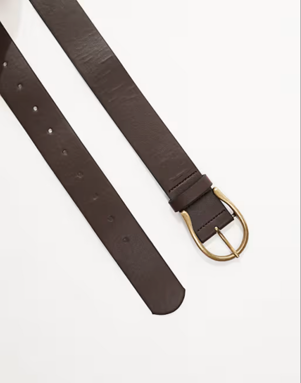 brown thick vintage-style belt styled with a neutral outfit
