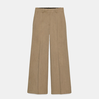 beige suit trousers from Zara styled as a smart outfit