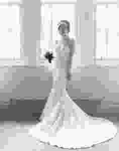 Kirsti on her wedding day. NutMeg Couture Wedding dress