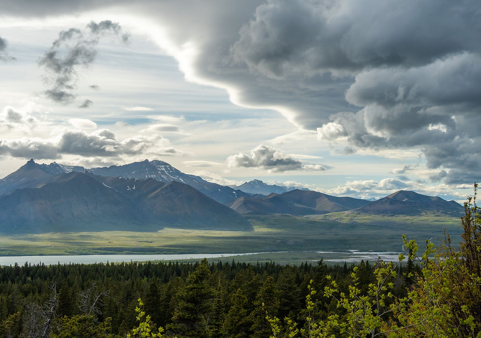 landscape view over Waterton Lakes National park with dark clouds rolling in