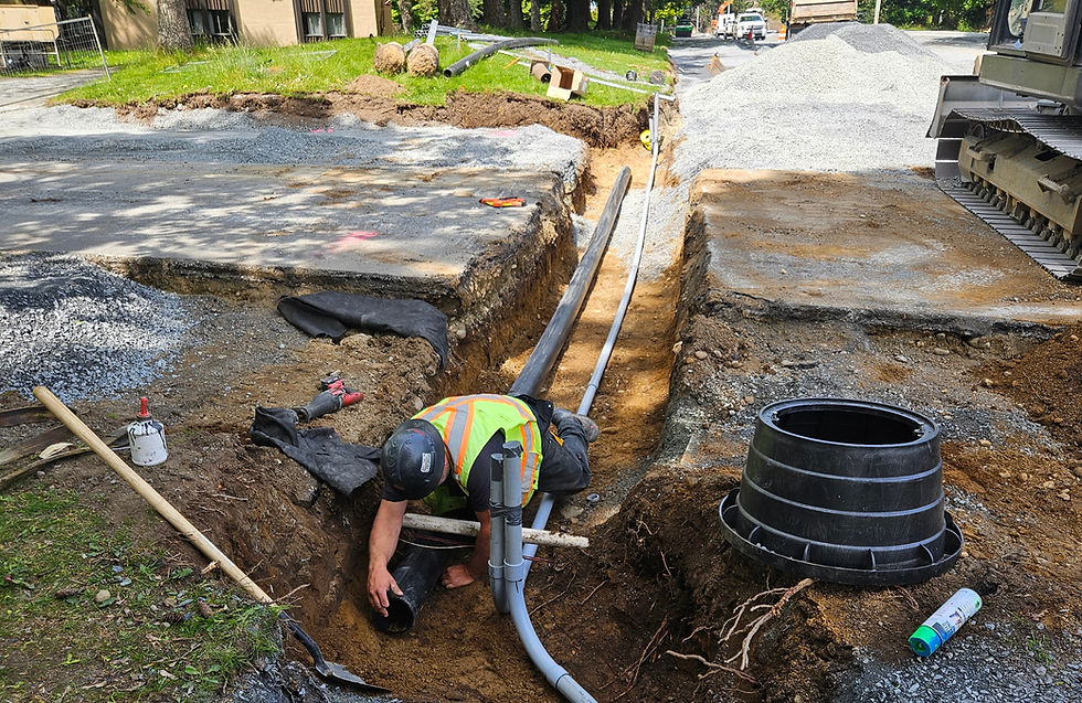 underground trench with conduit pathways being installed