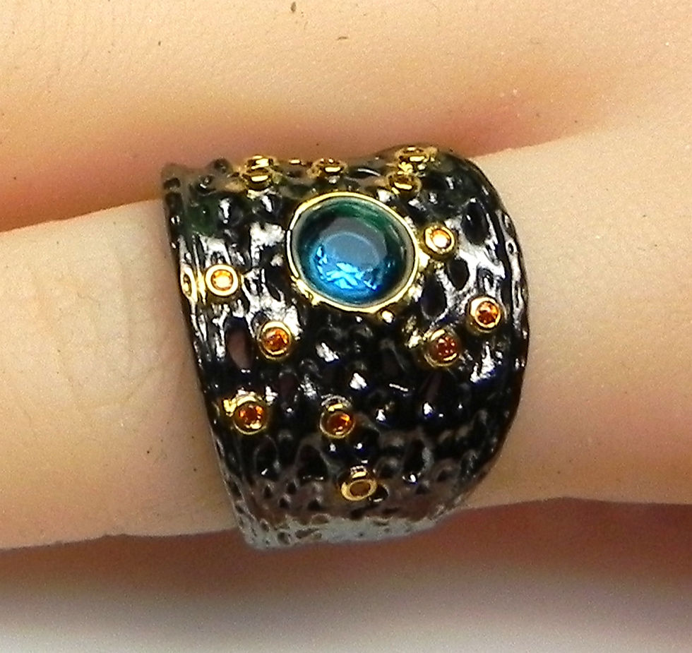 Thumbnail: Artisan Textured Two-Tone Statement Ring – Bezel Set Blue CZ with Gold Bezels
