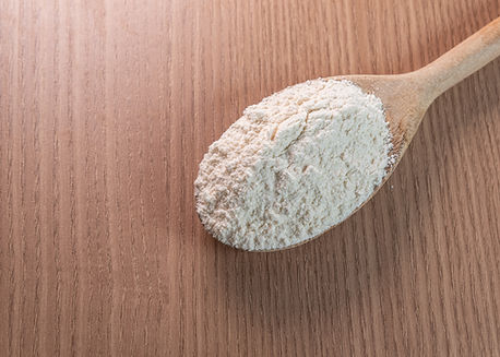 wooden-spoon-with-wheat-flour-wooden-table.jpg