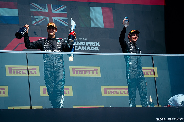 Kimi Antonelli on the podium alongside George Russell