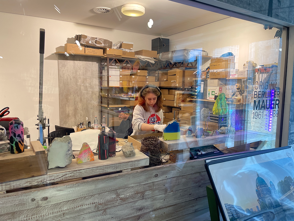 Berlin Wall fragment becoming a souvenir