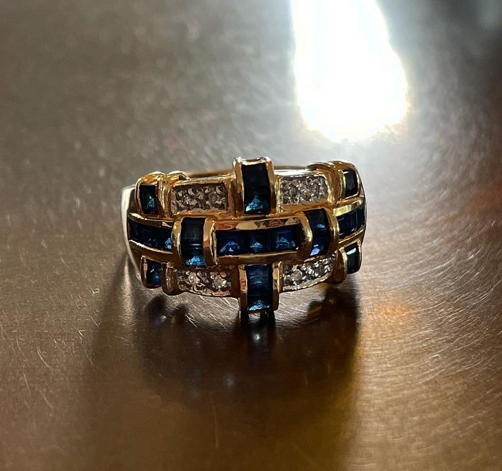 Thumbnail: Calibre-cut  sapphire  and diamond weaving ring