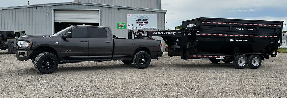 Ram truck with Roll off dump trailer