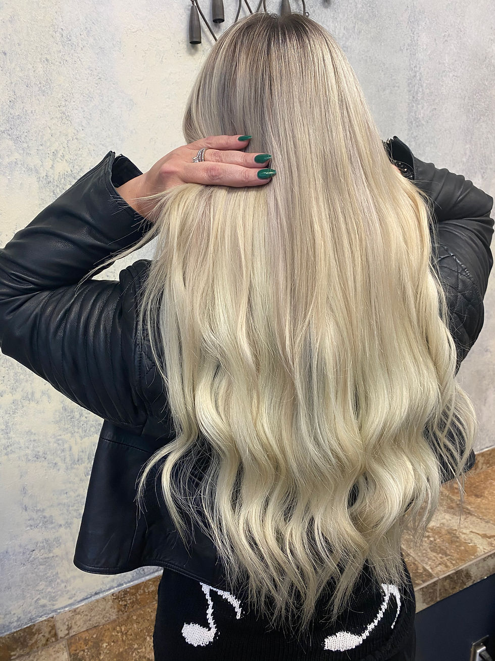 Long blonde extension transformation at Bella Dolche Salon and Spa in Everett, WA