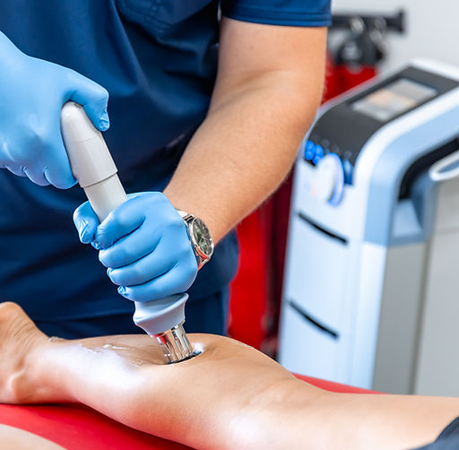 physical-therapy-shin-with-shock-wave-extracorporeal-shockwave-therapy.jpg