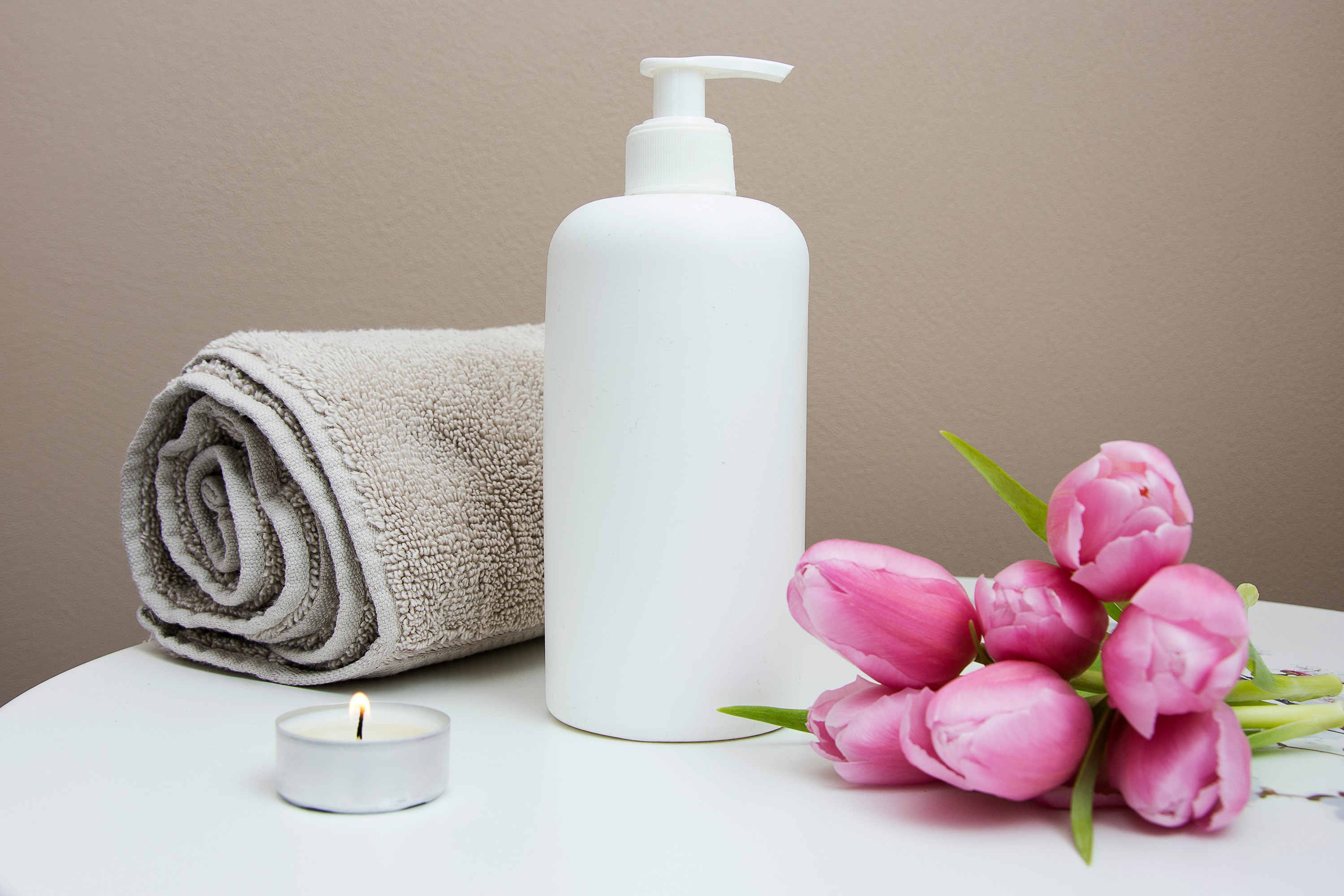Spa amenities arranged on a hospitality bathroom counter