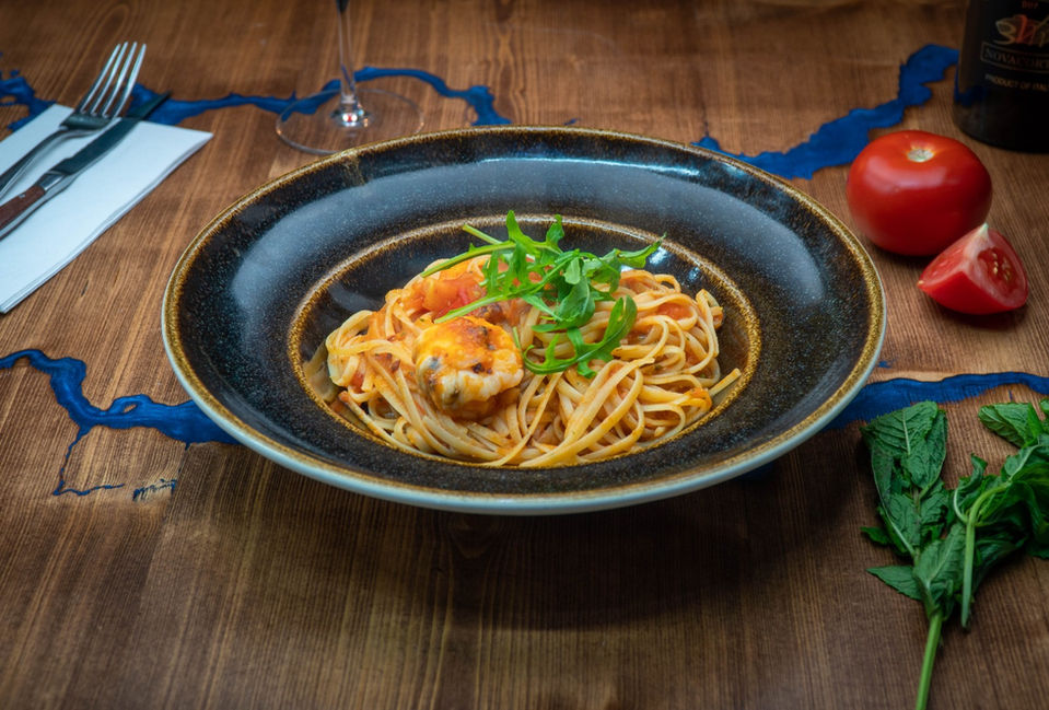A bowl of pasta.