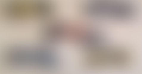 Five multi-tools of various brands (DeWalt, Bosch, etc.) on a wooden surface. Tools are in black, yellow, orange, and blue colors. No action.