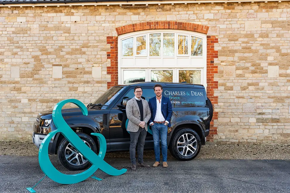 Charles & Dean Finance owners Tom and Simon outside their office