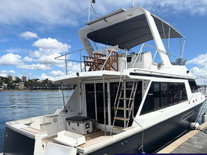 3M Satin Thundercloud 2080-S271 marine vinyl wrap applied to the hull of a 50ft Ocean Alexander motor yacht