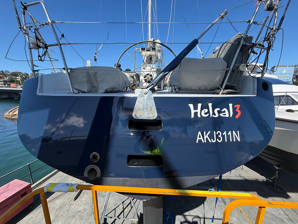 Compliant NSW boat registration numbers applied to a vinyl-wrapped hull, demonstrating correct size, contrast and placement on a modern vessel.