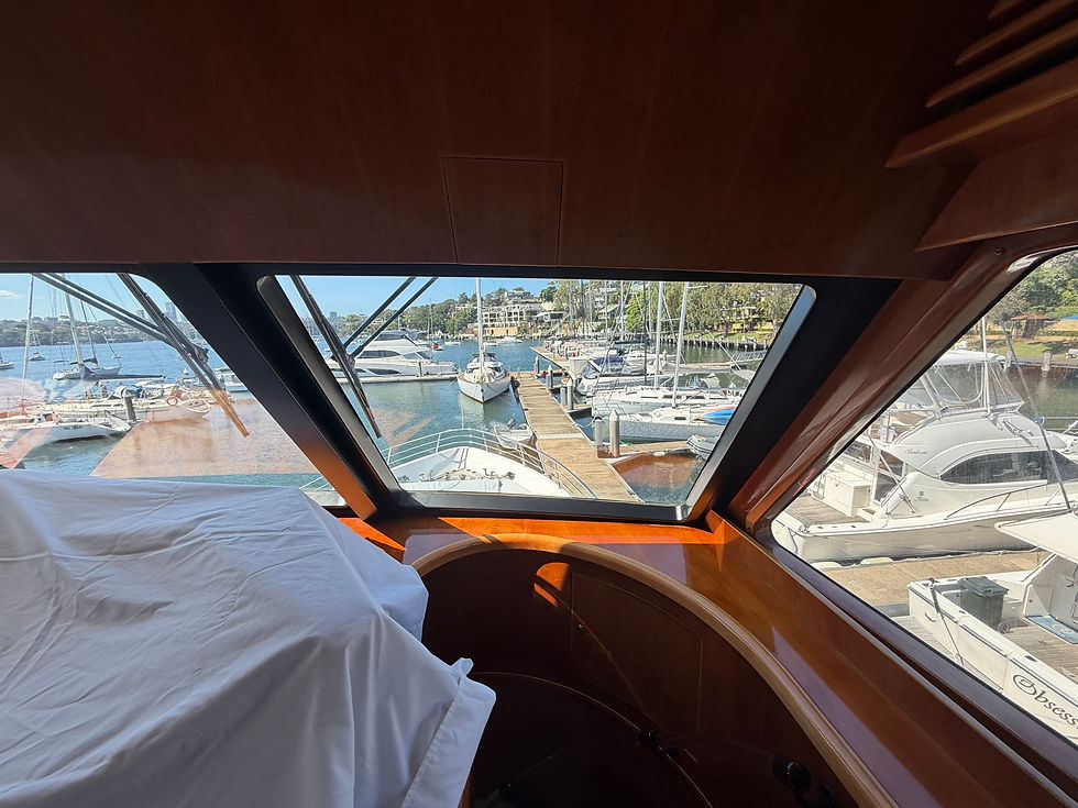 Yacht interior vinyl wrap grey finish flybridge lounge timber surfaces SALT Birchgrove marina.