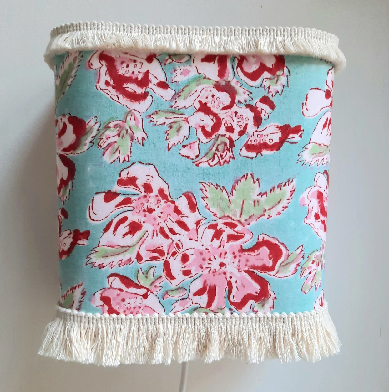 Applique textile en cotonnade indienne et frange