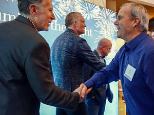 A dinner reception for clients and vendors at an Orlando conference.