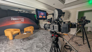 Cameras ready to film an interview at an Orlando conference
