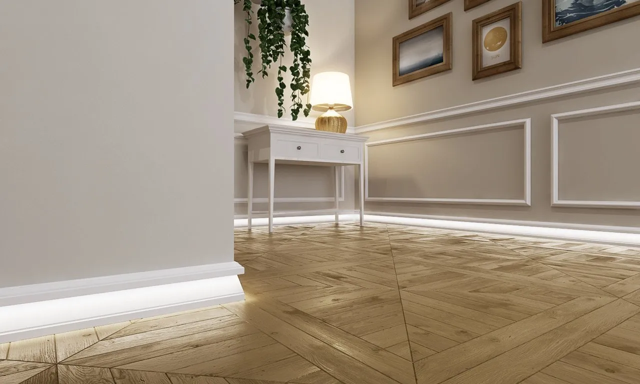 Gros plan sur une plinthe lumineuse encastrée au niveau du sol, conçue pour améliorer la visibilité et prévenir les chutes la nuit.