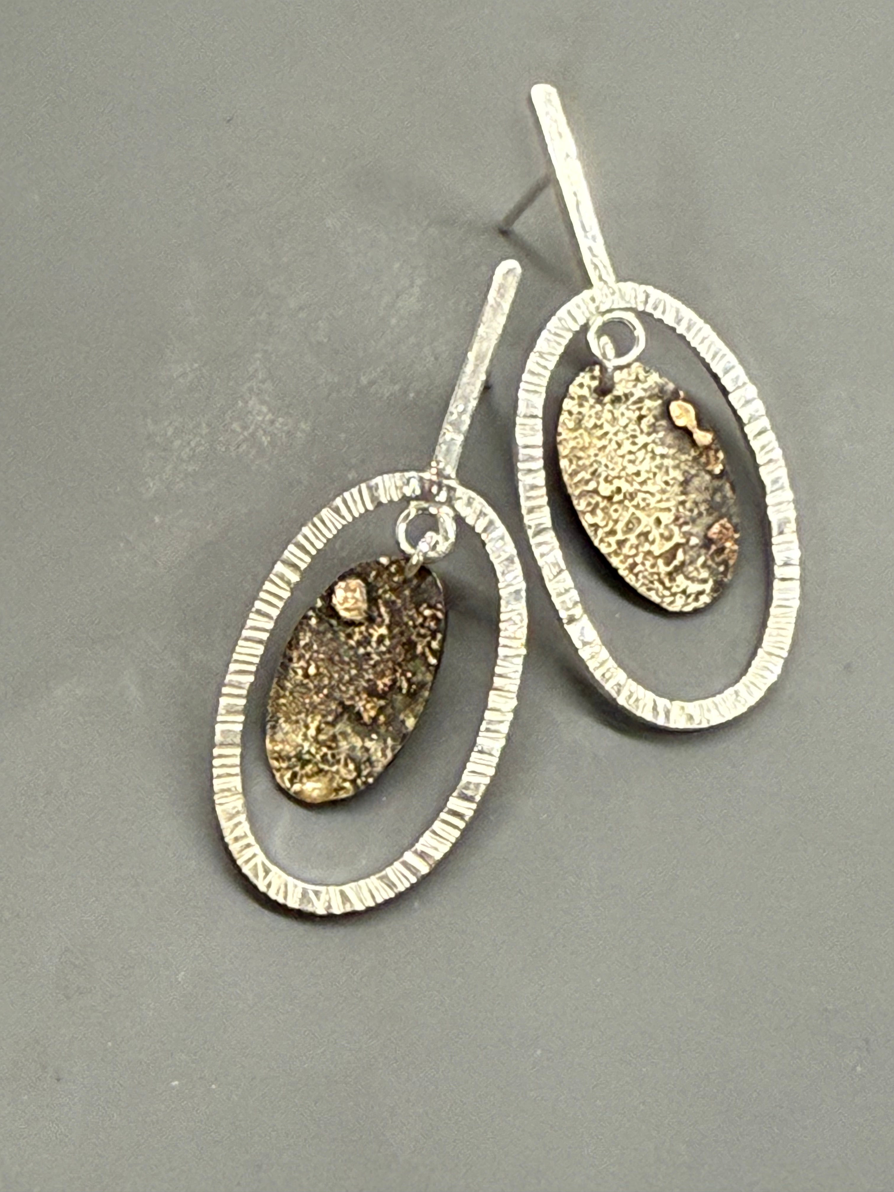 Steel oval w/silver frame