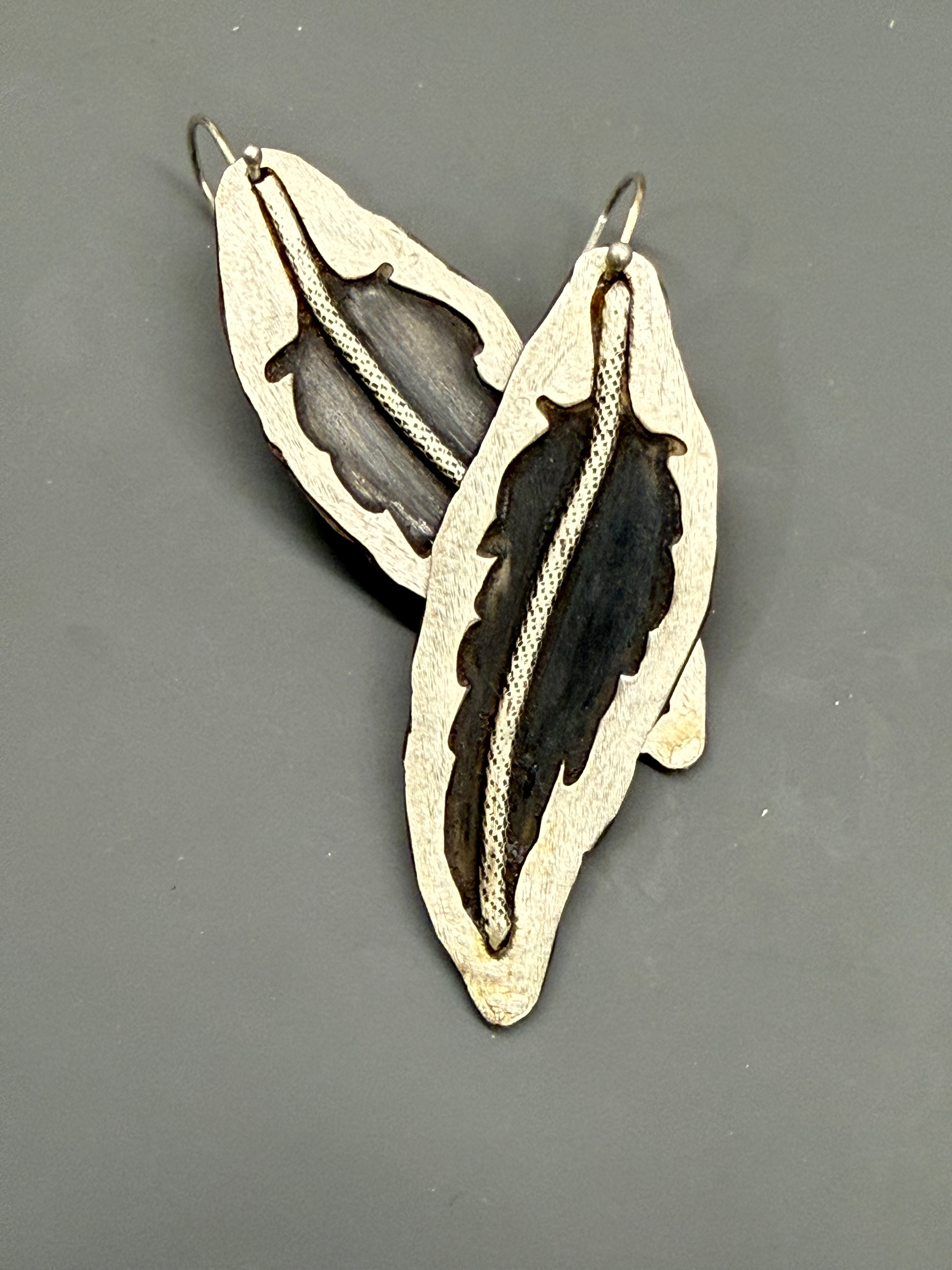 Steel silver feathers