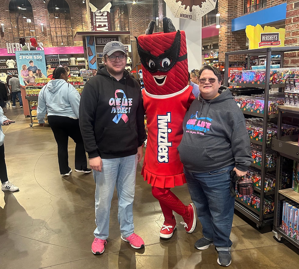 Senior Executive Director Alex Kovarovic and Senior Director of Education and Advocacy Aimee Eddy pose for a photo in Hershey, PA, during a 2025 fundraising week.