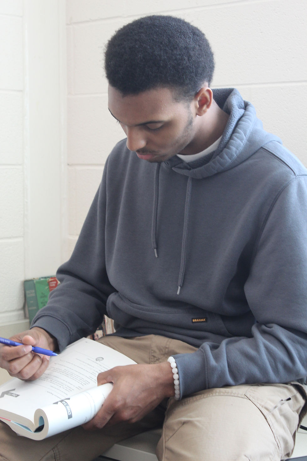 Senior Josiah Moore prepared for the AP Literature and Composition exam by going to an after-school session hosted by Mr. Kenealy. Photo by Myleigh Ryba