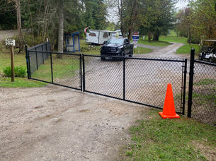 Black Chainlink Double Swing Driveway Fence Gates overlooking Gardom Lake in Enderby BC