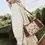 Thumbnail: 8" x 11" crossbody, 24" shoulder drop adjustable strap, leather & canvas, brown hues & medallion design print, Myra bag