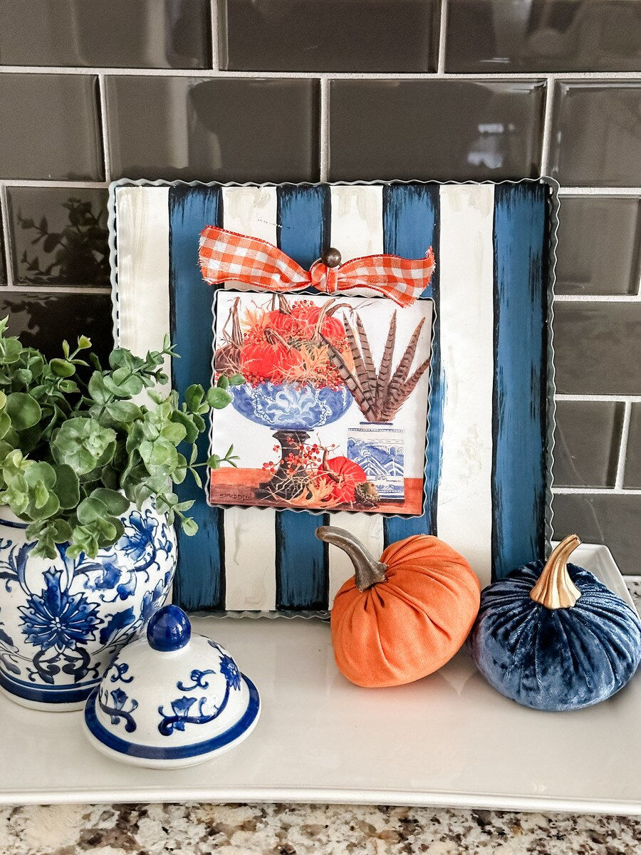 6" x 1" x 7" Round Top Collection print of a blue bowl full of orange velvet pumpkins, corrugated metal frame, ring on top