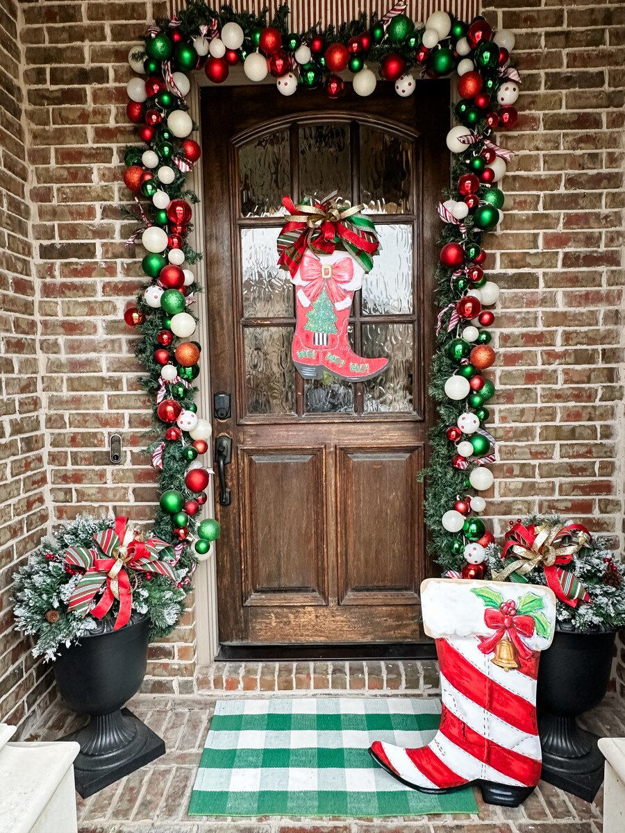 20" x .5" x 21" Round Top Collection PVC door hanger, red cowboy boot with "Ho Ho Ho" & a Christmas tree