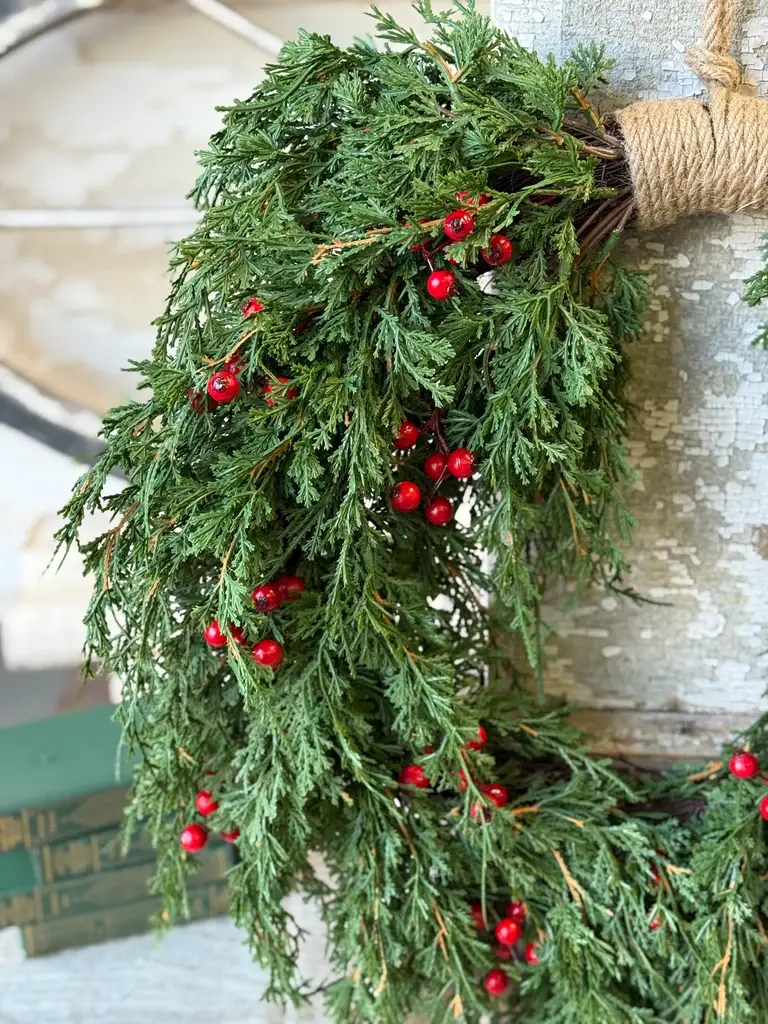 20" Emerald Celebration Hanging Wreath, soft touch greenery, draping nature, rich color dashed with bright red berry sprigs