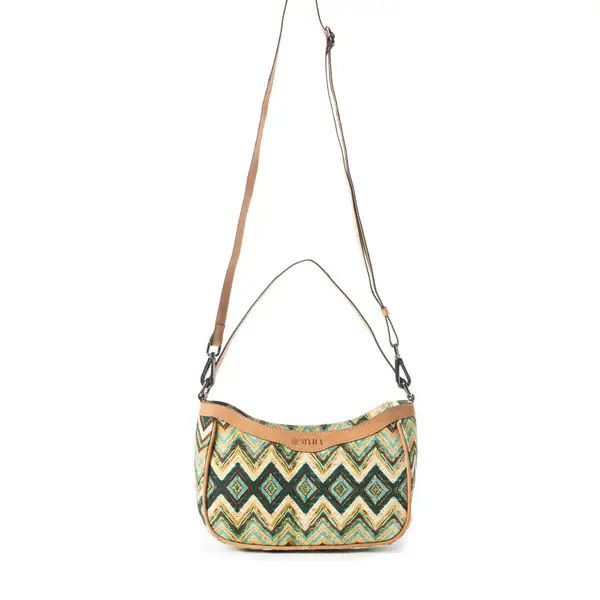 Thumbnail: 10" x 7" crossbody bag, 22" adjustable shoulder strap, canvas & leather, chevron & diamond pattern hues of green, cream & red