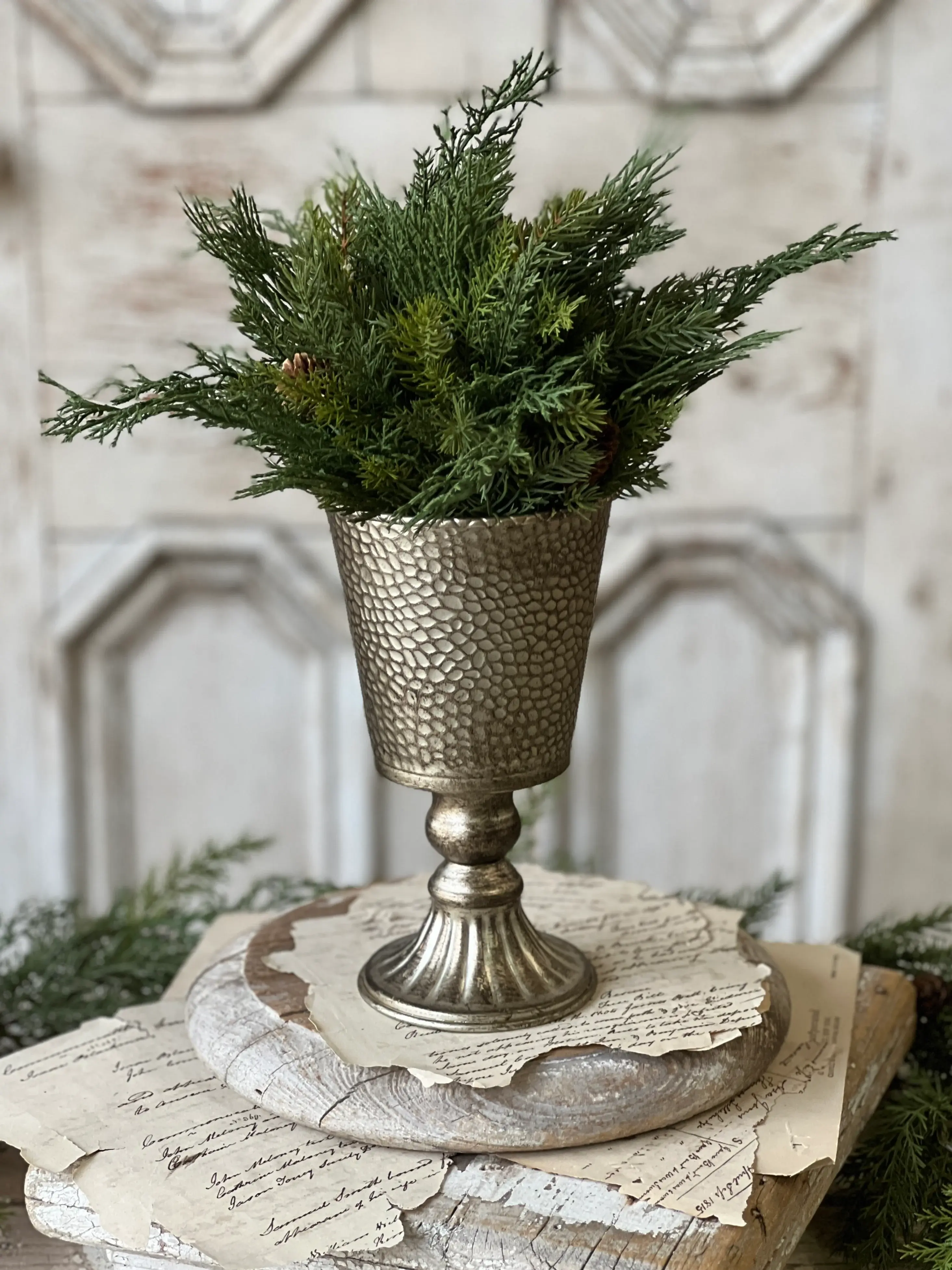8" tall metal cup on a pedestal, hammered texture and mercury like finish, use with floral picks & half spheres