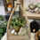 Thumbnail: 10.5” x 10.5” x 15” wood open air lantern in a pyramid shape with wood finial on top