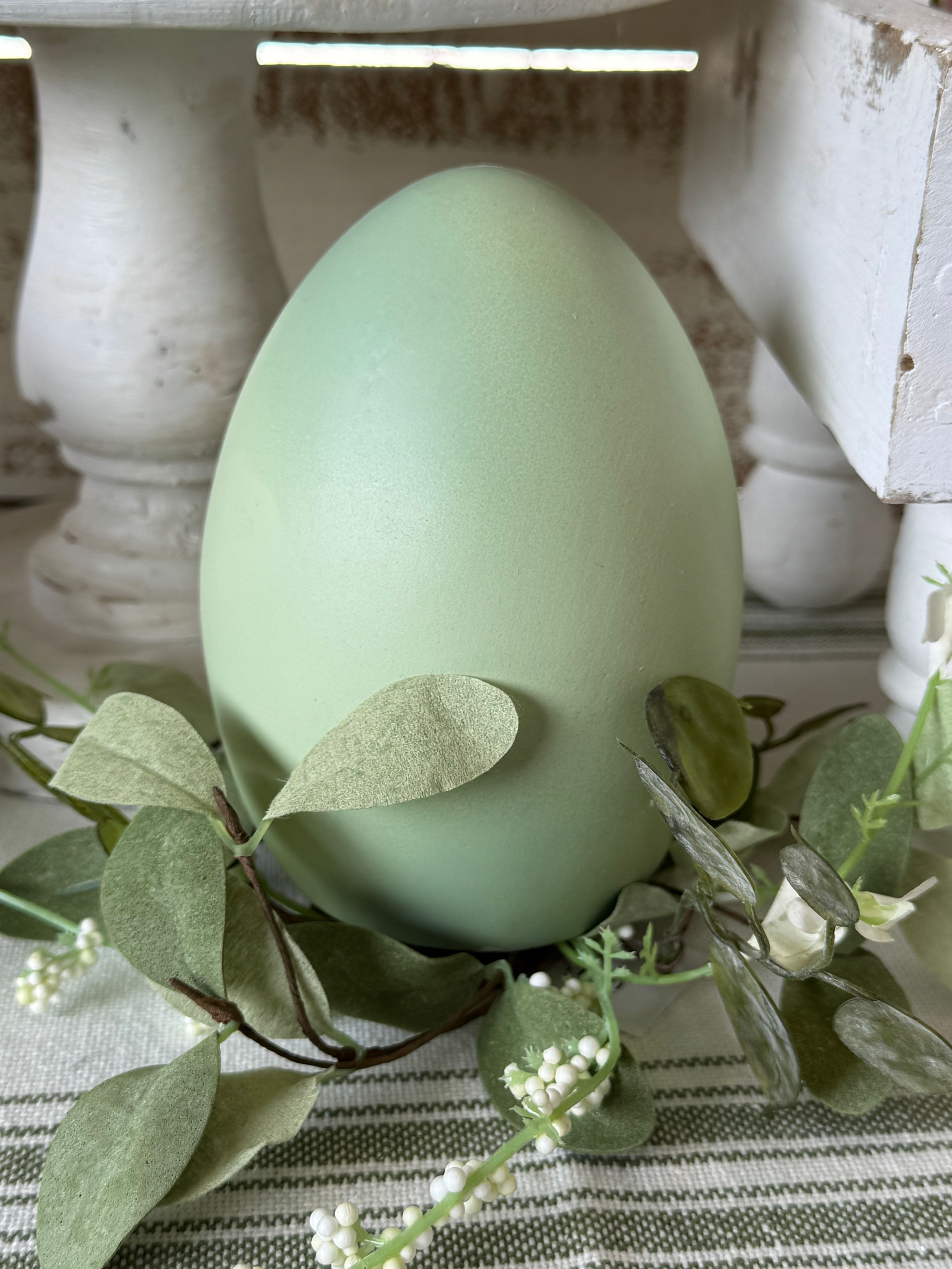 5.5" pottery egg, soft green, flat bottom for ease of sitting