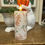 Thumbnail: 2” x 4” battery operated timer candle, 2 AA batteries(not included) 6hrs on/18hrs off, print of bunnies, carrots & Eastereggs
